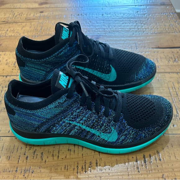 Nike Flyknit Black and Teal Sneakers - Picture 2 of 3